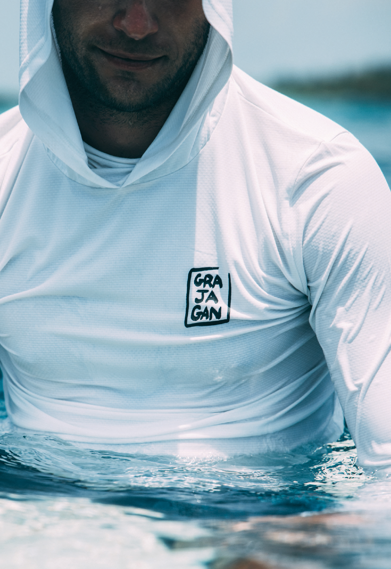 SURF-TEE MANCHES LONGUES À CAPUCHE UPF 50 +